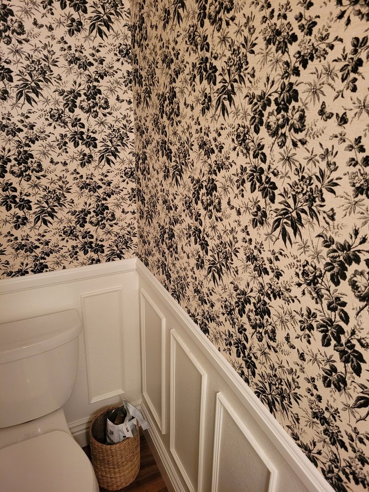 Nursery after beautiful wallpaper installation